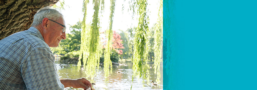 Man overlooking lake